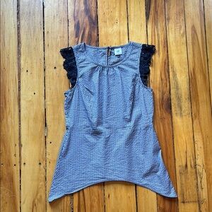 Blue and white Striped Sleeveless Top with lace accent on sleeves.